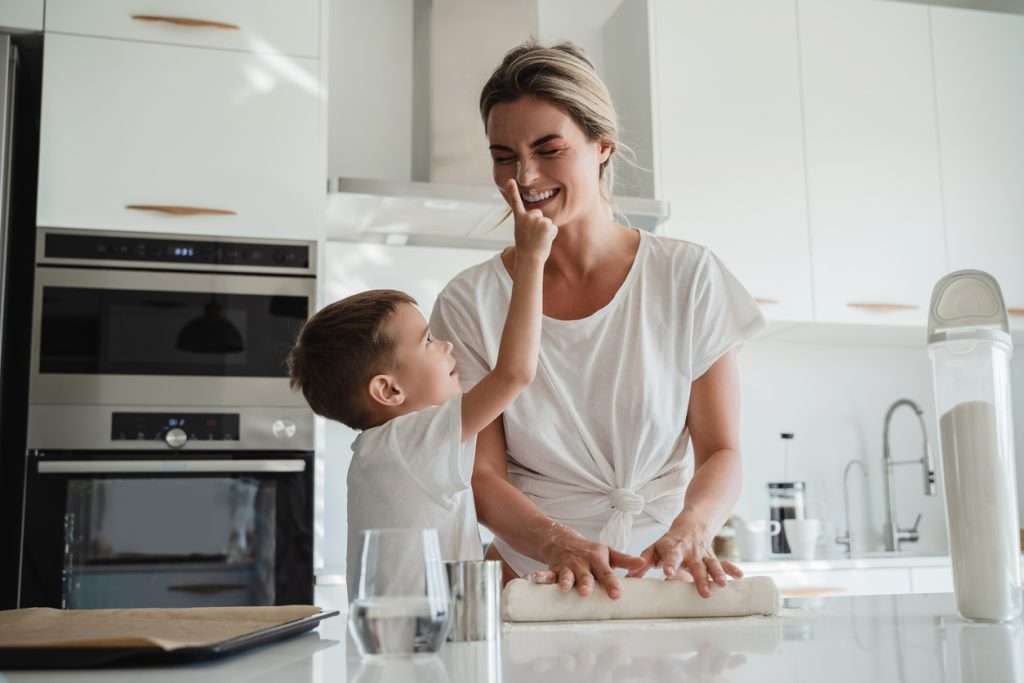 Happy Homeowner in Kitchen - Boise