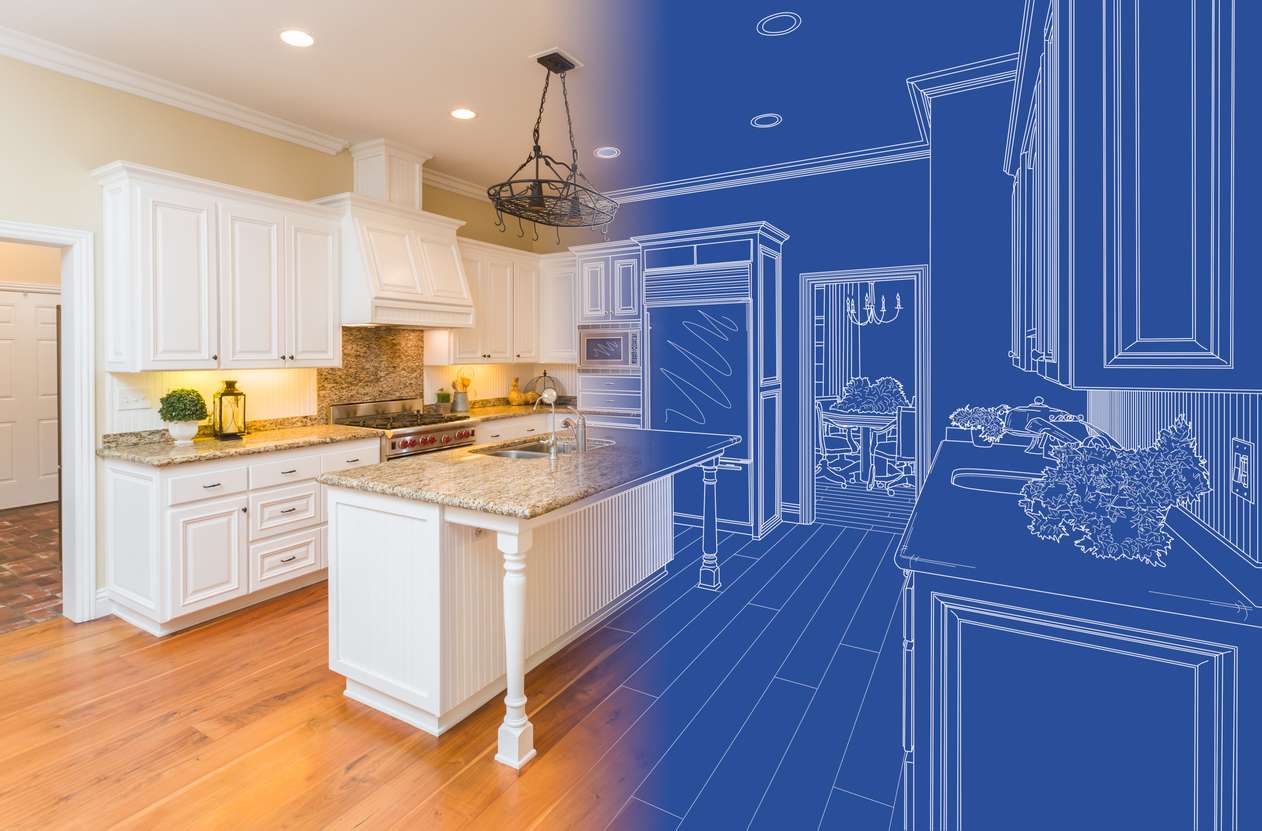 Boise and Eagle kitchen remodeling project shown transitioning from blueprint plans to finished white kitchen with island and hardwood floors